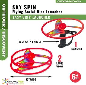 img 3 attached to Explore the Skies with Discovery Toys Sky Spin Flying Aerial Disc Launcher – Engaging STEM Toy for Kids 6 Years and Up