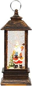 img 4 attached to 🎅 Enchanting Christmas Snow Globe Lantern Decoration: Lighted Water Glittering Snowing Globe Christians Lantern with Santa Claus for Magical Holiday Season Home Decor
