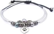 lizzy james silver charm bracelet - happy 2 strand adjustable design with heart shaped paw charm and small freshwater pearls logo