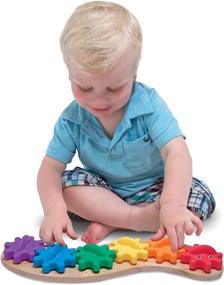 img 1 attached to Versatile and Colorful Melissa Doug Rainbow Caterpillar Building Set for Endless Creativity