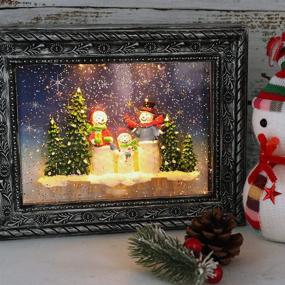 img 3 attached to Музыкальная рамка с водяным шаром Wondise - глиттерное рождественское украшение со снежинками на батарейках и с возможностью питания через USB - дизайн семьи снеговиков.