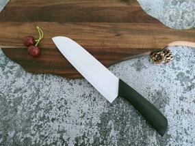 img 1 attached to 🔪 Деревянная керамическая серия Revolution - Прочный кухонный нож Santoku 7 дюймов с толстом и тяжелым клинком, нескользящей рукояткой - Идеально подходит для мяса, фруктов и овощей - Белый клинок (черная рукоятка) - Размер: 29x4.5 см