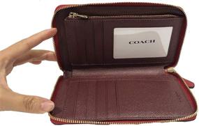 img 1 attached to Red Coach Crossgrain Leather Medium Zip Around Wallet (IM/1941) for Improved SEO
