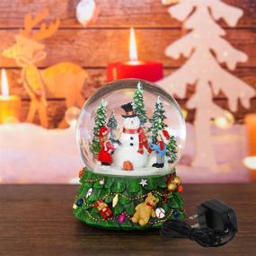 img 2 attached to 🎶 Aobaks 8.25" H 150mm 8 Music Song, Playing Snowflakes, Led Light, 6/18 Timer, Santa Claus Christmas Water Snow Globe Gift Home Decoration (Green): Enchanting Musical Snow Globe with LED Light for Holiday Home Décor