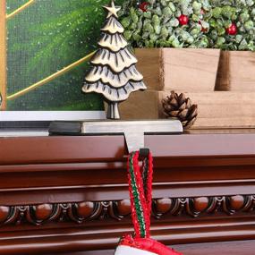 img 1 attached to 🎄 Jusdreen 6.05" Gilded-Bronze Christmas Pine Tree Stocking Holders: Sturdy Metal Fireplace Mantle Hangers - Decorative Christmas Decorations in Gilded Bronze