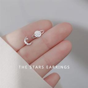 img 3 attached to Small Cartilage Stud Earrings for Women Teen Girls, CZ Asymmetric Star Moon Planet Design, Sterling Silver White Gold Plated, Hypoallergenic Piercing Post Jewelry Gifts for Birthday, BFF, Daughter, Sister, Xmas - 20g