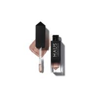 🎨 haus laboratories от леди гага: откройте для себя glam attack жидкую тени для век. выбирайте из 13 оттенков с блеском и 4 металлических оттенков. познайте долговечность, способность легко растушевываться и насыщенность этой жидкой декоративной косметики для глаз. 100% веганская и без жестокости! логотип