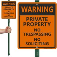 lawnboss sign - caution: private property no trespassing logo