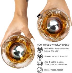 img 2 attached to Whiskey Stones Gift Set - 4 Extra Large Stainless Steel Whisky Ice Balls, Special Tongs & Freezer Pouch in Luxury Gift Box. Perfect Gift for Whiskey Lovers - Ideal for Men & Women!