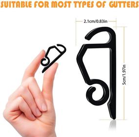 img 3 attached to 🎅 TITE 100 PCS Mini Plastic Gutter Hanging Hooks for Outdoor Christmas Party & Birthday Wedding Decoration - Clips for Christmas Lights (E)