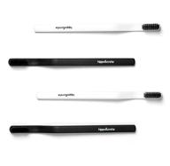 hippocrate charcoal toothbrush - dentist approved with soft bristles (4 pack) logo