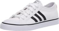 👟 adidas originals unisex nizza sneaker boys' shoes: classic sneakers with timeless style logo