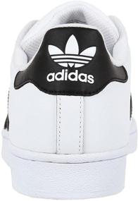 img 2 attached to 👟 Ultimate Style & Comfort: Adidas Originals Superstar Sneaker White Men's Shoes – Trendsetting Fashion Sneakers