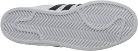 img 1 attached to 👟 Ultimate Style & Comfort: Adidas Originals Superstar Sneaker White Men's Shoes – Trendsetting Fashion Sneakers