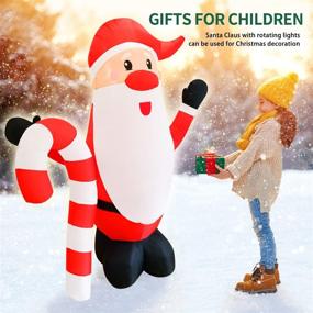 img 3 attached to Outdoor Yard Decor: 6ft LED Projector Inflatable Santa Claus for Christmas Party Blow up