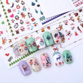 img 2 attached to QIMYAR 10-Pack Christmas Nail Stickers with Tweezers - 3D Self-Adhesive Nail Decals featuring Santa, Reindeer, Wreath, Bell, Candy Cane, Christmas Tree, Hat, Socks, Penguin, Puppet, and Gift Designs - DIY Nails Manicure Tips Decor