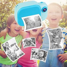 img 3 attached to 📸 Улучшенная детская камера для селфи-видео: мгновенная печатная камера без чернил, двойная объективная система, 4 рулона печатной бумаги, аккумулятор на 1000 мАч - идеальный игрушечный подарок для мальчиков и девочек.