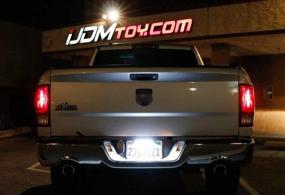 img 1 attached to 💡 Enhance Your Vehicle's Visibility with iJDMTOY 35-074-White License Plate Frame Mount 12V 24-SMD High Power Xenon White LED Rear Backup Reverse Light Kit
