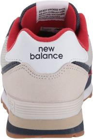 img 2 attached to 👟 Kids' 574 V1 Lace-up Sneaker by New Balance