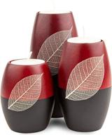 iyara craft 3 wooden candle holders – decorative candle holders with beautiful dry leaf décor – exquisite details – elegant matte wood finish – perfect for modern & rustic settings – red and black two-tone (rugby shape) logo