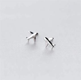 img 1 attached to ✈️ CZ Airplane Earrings - Women & Teen Girls S925 Sterling Silver 18K White Gold Plated, Cubic Zirconia Inlay Tiny Plane Studs, Hypoallergenic, Airline Jewelry - Ideal Souvenir & Gifts