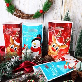 img 2 attached to 🎄 Premium Plastic Christmas Bags: Festive Candy & Treat Wrapping Bags for Merry Christmas Party Supplies