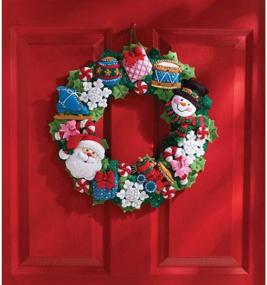 img 1 attached to 🎄 Bucilla Christmas Toys Felt Applique Wall Hanging Wreath Kit, 15" x 15" - Item #86363