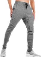 stylish and practical: tbmpoy men's tapered joggers with zipper pockets - ideal for athletic running and gym workouts logo