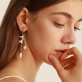 img 3 attached to 🎨 Giorgio De Chirico Art Inspired Asymmetric Dangle Earrings - Mystery and Melancholy of a Street, 18K Gold Plated Brass - Unique Designer Jewelry