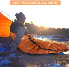 img 2 attached to 🏕️ DIBBATU Emergency Survival Sleeping Bag: Thermal Bivy Sack Blanket - Waterproof & Lightweight Mylar Portable Nylon Sack for Camping, Hiking, and Outdoor Adventure Activities. Also Supports the Help for Homeless Individuals