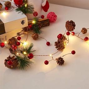 img 4 attached to 🎄 7FT Christmas Garland with 20 LED Lights: Festive Pinecone, Red Berry, and Pine Cone Bristle Decor for Indoor/Outdoor Thanksgiving and Xmas Celebration - Battery Operated Fairy Lights Perfect for Garden Garland, Party Decorations