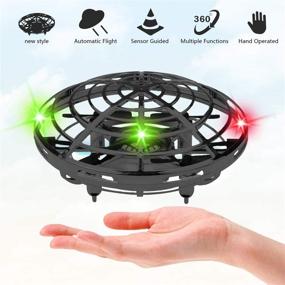 img 4 attached to 🛸 Rechargeable UFO Flying Ball Toys: Mini Quadcopter for Kids and Adults, Hand-Controlled with 360° Rotating LED Indicator - Gravity Defying Helicopter Gift