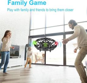 img 3 attached to 🛸 Rechargeable UFO Flying Ball Toys: Mini Quadcopter for Kids and Adults, Hand-Controlled with 360° Rotating LED Indicator - Gravity Defying Helicopter Gift