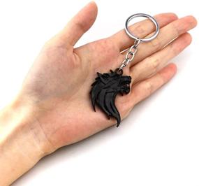 img 3 attached to 🐺 Кульный значок-эмблема с изображением волчьей головы для автомобиля - брелок с 3D плашкой для ключей в подарок для автомобиля (черный брелок)
