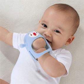 img 1 attached to 🐧 Silicone Baby Teething Toy - Smily Mia Penguin Buddy, Never-Drop Chew Toy for 0-6 Month Infants, Sucking Needs, Hand Pacifier for Breastfeeding Babies, Car Seat Toy for Newborn, Light Blue