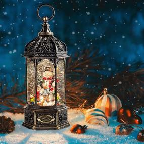img 1 attached to 🎅 Magical Christmas Snow Globe with Swirling Glitter, Snowman Ornaments, and Rotating Scene - Bluetooth Speaker Christmas Decoration for Home