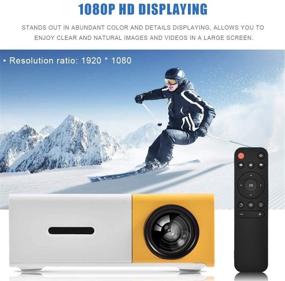 img 2 attached to 📽️ Portable Mini Projector with Built-in Stereo Speaker - Multimedia Home Theater Projector, HDMI/AV/USB Interface, 320x240 Resolution (White-Yellow)