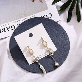 img 1 attached to 🌙 Dainty Long Dangle Earrings: Upgrade Your Style with Fashion Gold Silver Moon Stars Sun Earring for Women and Girls