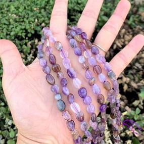 img 2 attached to 🔮 Natural Super Seven Quartz Gemstone Beads - 6mm to 10mm Free Form Oval Tumbled Pebble Stones - 15 inch Strand (Amethyst, White Smoky Quartz, Cacoxenite, Goethite, Lepidocrocite, Rutile) GZ12-36