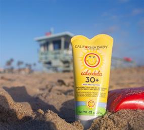 img 2 attached to 🌞 Крем California Baby Calendula SPF 30+ для лица и тела - идеально подходит для аллергиков и чувствительной кожи! Не содержит дополнительных ароматизаторов, распространенных аллергенов и раздражителей. Подходит для малышей, детей и взрослых. Календула, 2,9 унции