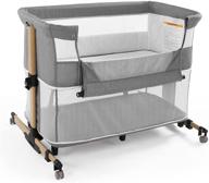 versatile gray baby bassinet: 3-in-1 adjustable bedside sleeper, crib, and travel portable bed for infants logo