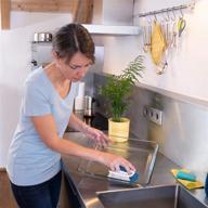 efficient cleaning with the unger cookware and bakeware brush logo