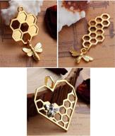 🐝 honeycomb bee charms: 20 pack large 1 1/8 - 1 3/4 inch (gold tone group) - diy jewelry making supplies by jgfinds logo