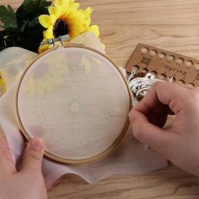 img 3 attached to 🧵 Полные наборы вышивания для начинающих: BENBO Creative Dandelion Hand Embroidery Cross Stitch Needlepoint Crafts с цветной схемой на ткани, бамбуковым кольцом, нитками и инструментами.