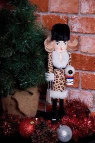 img 1 attached to Clever Creations Leopard Print Female Shopper 15 Inch Nutcracker - Festive Christmas Decor for Shelves and Tables