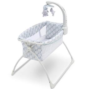 img 1 attached to 🛏️ Delta Children Deluxe Activity Sleeper Bedside Bassinet - Складная переносная детская кроватка с колыбельным механизмом для новорожденных в рисунке "Windmill", 31,69х26,77х22,44 дюйма (набор из 1)