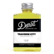 detroit grooming co. traverse city cherry tobacco beard oil - ultra hydrating, all natural 1oz men's essential oil for itch relief, softening, full growth, and thickening logo