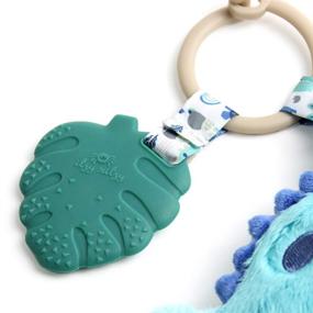 img 2 attached to 🦖 Itzy Ritzy Infant Toy & Teether - Itzy Pal; Lovey, Crinkle Sound, Textured Ribbons & Silicone Teether; Dinosaur Design