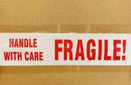 📦 fragile shipping adhesive packaging by prinko logo