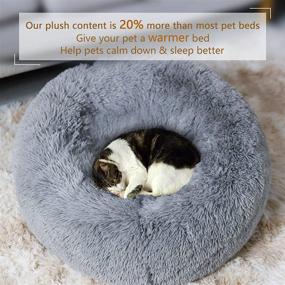 img 2 attached to 🐾 Ultra-Comfort Plush Calming Dog Bed - Anti-Anxiety Donut Cuddler for Small, Medium, and Large Dogs & Cats - Machine Washable and Waterproof Bottom - Premium Faux Fur Pet Bed